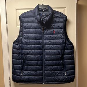 Polo Ralph Lauren light puffer vest navy with red insignia. Gently worn